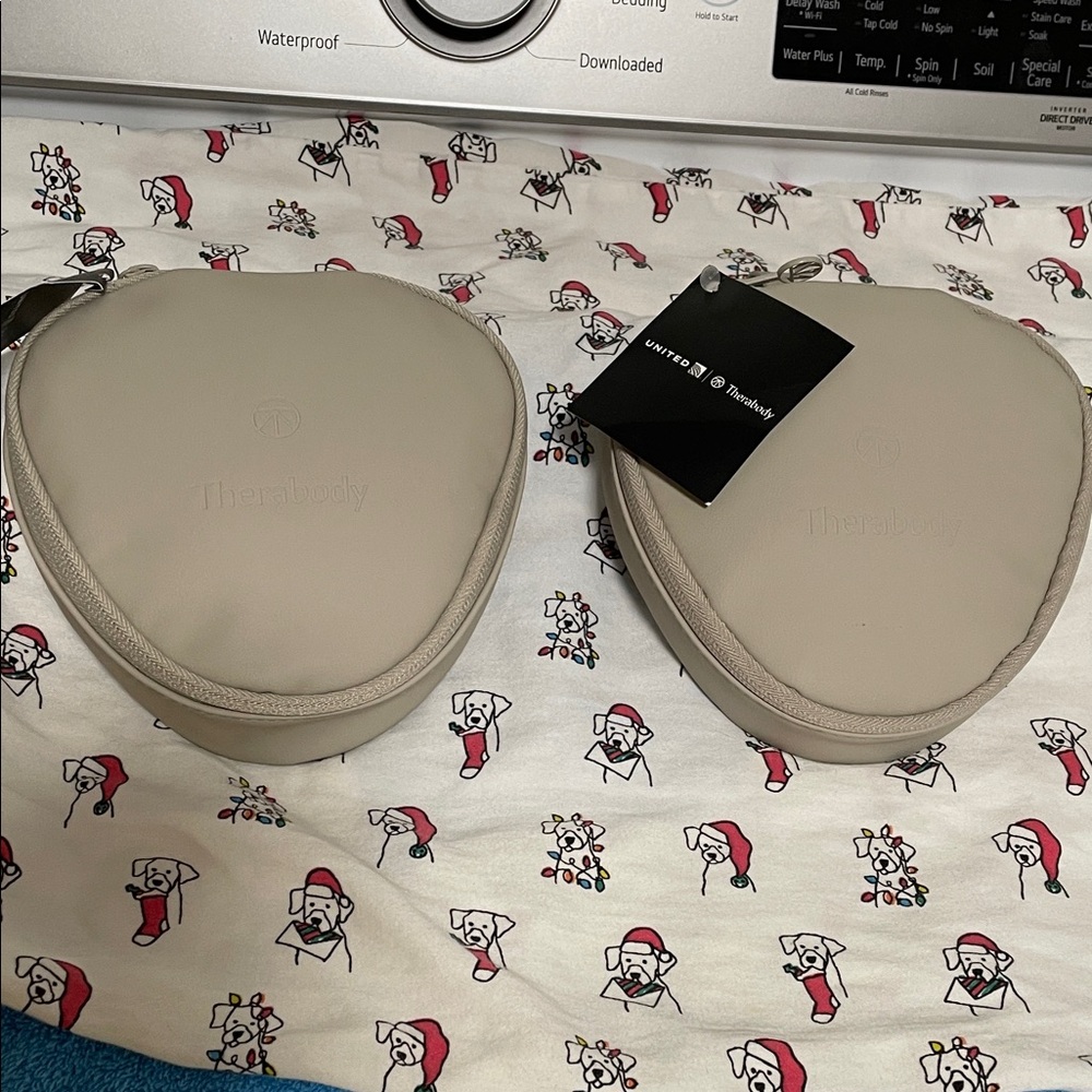 Two United Airlines Therabody Amenity Kits